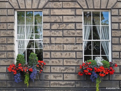 Picture of Old stone house with colorful window flowers Edinburgh